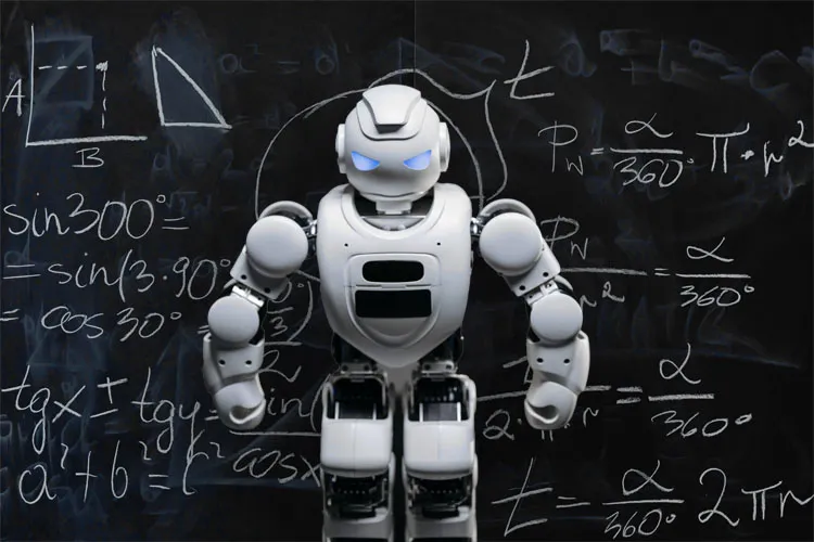 Robot in front of a blackboard written full of formulas.